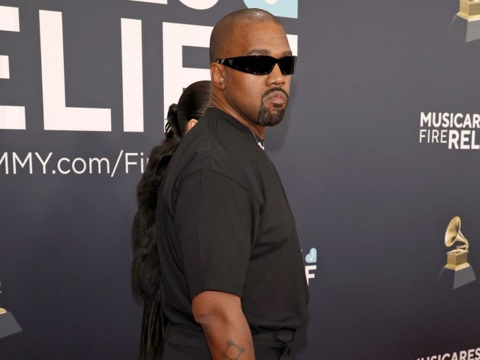Kanye West settles lawsuit with former assistant over allegations