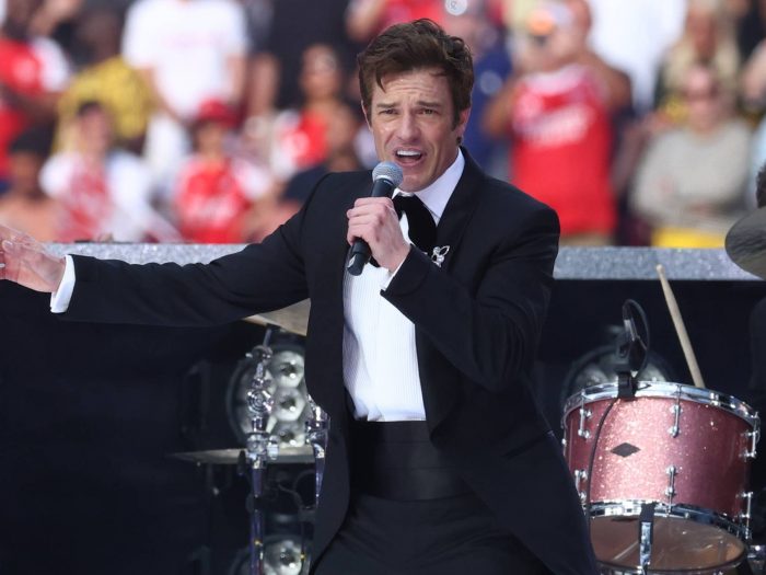 Brandon Flowers debuts solo tracks and Killers classics at Newport Folk Festival